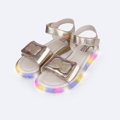 Sandália de Led Infantil Pampili Lulli Laço Glitter Dourada - frente da sandália com laço de glitter