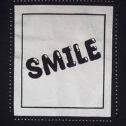 Camiseta Infantil Pampili Smile Preta e Prata Holográfica - estampa da camiseta