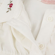 Vestido de Bebê Bambollina Bordado e Babado Off White - vestido de bebê com fecho em botões